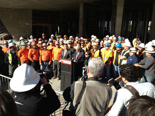 Eli Broad and L.A. Mayor Antonio Villaraigosa are flanked by representatives of some of the many unions who attended the Broad topping out.