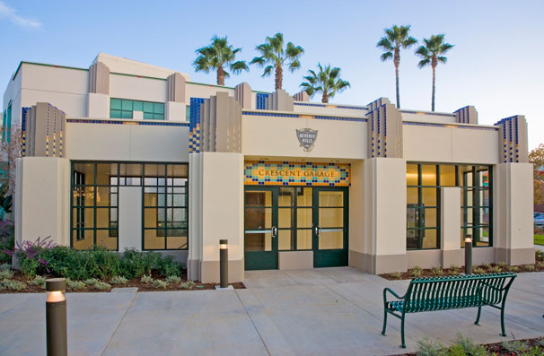 The southern elevator pavilion serves the civic center buildings, whose style it complements. Decorative tile is repurposed from supplies remaining from a previous project.