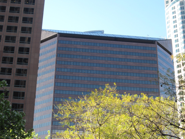 The building features an angled window on the top level