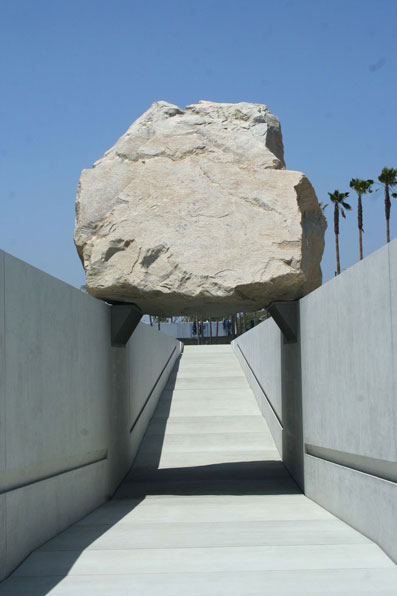 While most people think of Levitated Mass only in terms of the massive boulder, the art installation actually comprises 2 elements: the rock, and the 456 ft long architectural concrete trench that supports it. Rendering it featureless enough to escape the viewer's awareness was key to creating the illusion of levitation. MATT self-performed the concrete.