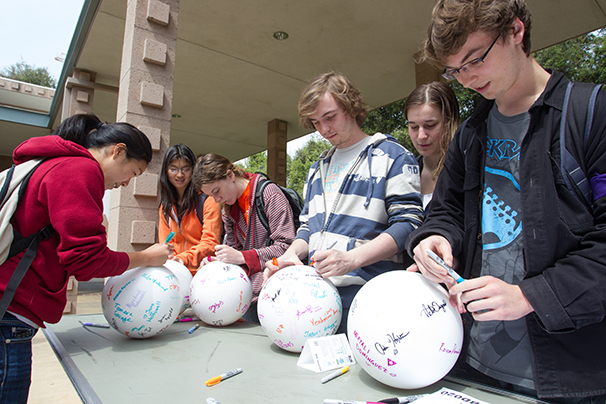 HMC students sign the 